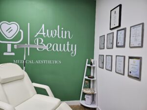 Treatment room at Awlin Beauty in Maidstone, with Clare's framed qualifications and certificates on display