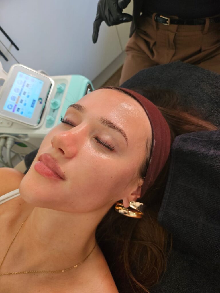 Client with glowing, hydrated skin immediately after a facial at Awlin Beauty in Maidstone
